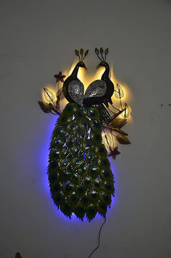 Double iron peacock wall decor with bright LED lights, black peacocks and green feather body