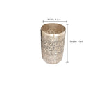 One engraved silver-toned glass, height 4 in, width 3 in