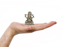 AONA Super Fine Brass Lord Ganpati murti on open palm, seated on lotus base