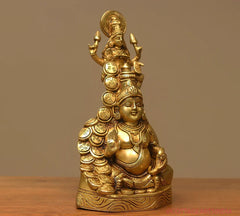Brass Kuber–Laxmi sculpture side view, seated figure with halo, 10 inch