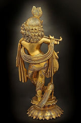 Back view Krishna playing flute brass idol, detailed ornaments, raised crown and garlands