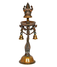 Front view brass Ganesha diya lamp with four hanging brass bell holders
