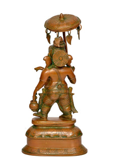 Brass Ganesha statue back view with parasol, textured clothing, circular canopy