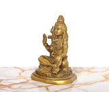 Brass Lord Shiva figure, side view with trident and blessing hand, seated, 6.5-inch.