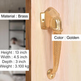 Golden brass door handle pair with Ganesha face backplate and arched grip