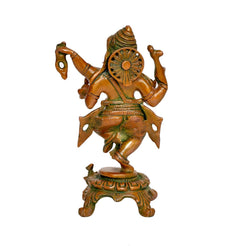 Rear view of brass dancing Ganesha statue with wheel motif and green detailing