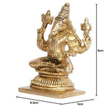 Brass tone deity idol statue, size 6.5cm x 4cm x 9cm shown beside figure