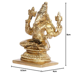 Brass tone deity idol statue, size 6.5cm x 4cm x 9cm shown beside figure