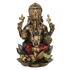 Ganesha polyresin sculpture, seated with red-and-gold ornaments and raised hands