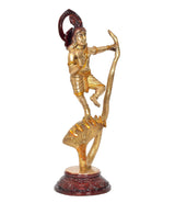 Angled view Krishna idol dancing on Kaliya serpent with maroon pedestal base