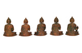 Back view of five brass Buddha statues, carved seated figures with textured details