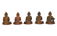 Back view of five brass Buddha statues, carved seated figures with textured details