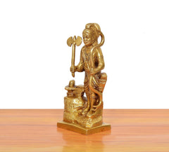 Gold brass Parshuram murti statue, side view with axe and curved weapon grip