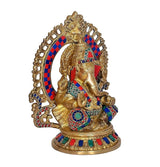 Brass Ganesh idol in seated meditation, multicolor inlays on trunk and outfit