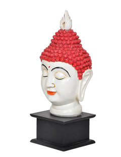 Resin Buddha head statue side view, red beaded headdress, black base pedestal