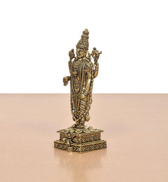 Side view of standing Lord Balaji idol on ornate pedestal base, bronze finish
