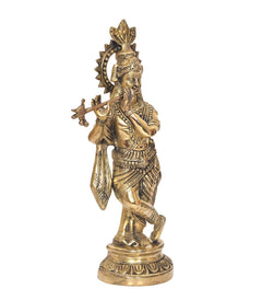 Brass Krishna idol playing flute, angled view with crown and patterned robe