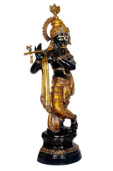 Krishna brass statue standing, gold robes and black base with decorative trim