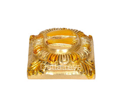 Lakshmi charan paduka brass finish, side view of lotus-framed footprints
