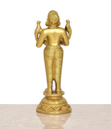 Brass Lakshmi oil lamp diya figurine, rear/side view, raised hands holding bowl