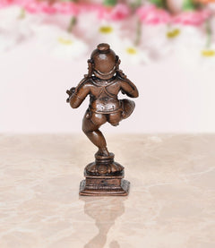 Copper Bal Krishna dancing figurine, 3.5 in, detailed side pose on pedestal