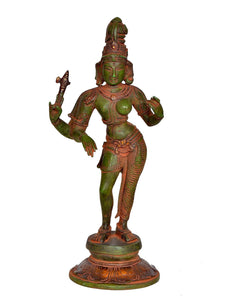 Dancing Ardhanarishvara brass statue, front view, green and red detailing
