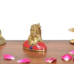 Brass Adiyogi Shiva idol side view, red robe tiles and blue centerpiece bead