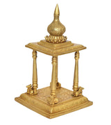 Brass pooja mandir angled view, carved pillars and engraved square base tray