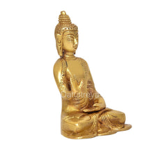 Messing-Buddhafigur, Seitenansicht: sitzend mit Abhaya-Mudra-Geste