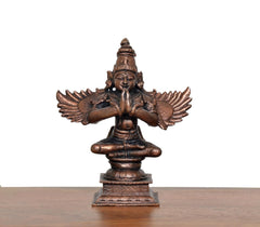 Copper Garun Bhagwan idol, front view, wings spread, hands held together