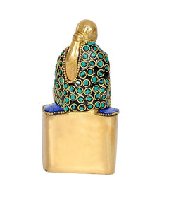 Brass Shirdi Sai Baba statue idol, back/side view with green gemstone-style detailing