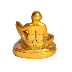 Brass Swami Samarth Akkalkot idol, seated front with engraved pedestal and garment lines.
