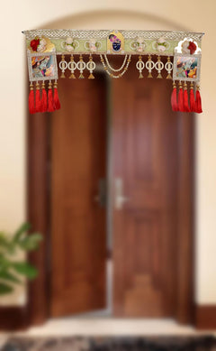 Radha Krishna toran door decor with red tassels, pearl garland, and gold bell ornaments