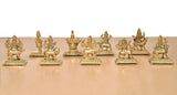 Brass Navdurga idol figures, seated and mounted poses on square bases
