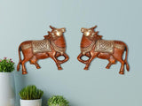 Brass Kamdhenu cow pair wall hanging, two standing cows facing opposite directions
