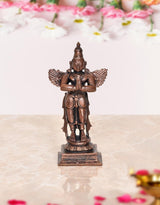 Copper standing Garuda idol statue with folded hands and arched wings for home decor