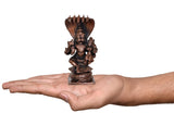 Copper Lakshmi Narasimha figurine shown in hand, about 4 inch height