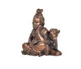 Copper Bal Gopal idol holding cow, side angle with detailed ornaments