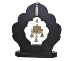 Back view of brass swastik bell wall hanging with hanging loop and support bar