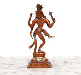 Brass Ardhanarishvara murti from behind, carved ornaments and base