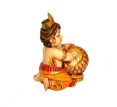 Laddu Gopal resin idol, back/side view with crown and painted jewelry, holding butter pot.