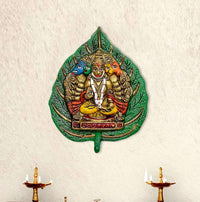 Metal Panchmukhi Hanuman wall hanging with five faces, green leaf border and pedestal