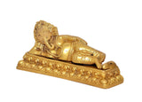 Brass relaxing Ganesha statue, side view, ornate pedestal base for home decor