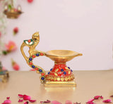 Brass peacock diya oil lamp with hanging bell, red base and multicolor enamel