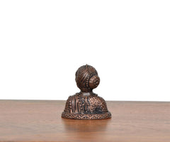Copper Gowri Idol back view, copper-tone with textured hair and layered back drape