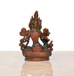 Brass Tara Devi statue, back view of seated multi-armed goddess on lotus pedestal