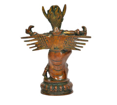 Brass Garun Bhagwan idol, back view, wing-like hair and long extended arms