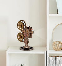 Resin steampunk projector statue with brass gears, metal-look body and LED lens