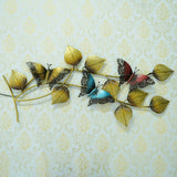 Metal leaf and butterfly wall hanging with LED effect, gold, black and blue accents