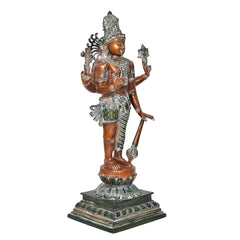 Brass Hariharan half Shiva half Vishnu statue, angled view with ornate headpiece